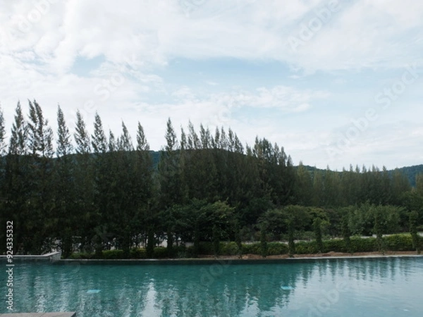 Fototapeta Landscape view of Kao Yai surrounding by Pine forest and swimming pool as a foreground, Pak Chong district, Nakorn Ratchasima, Thailand.