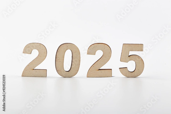 Fototapeta Wooden block 2025 text on table background.