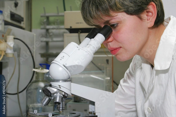Fototapeta Scientist and microscope