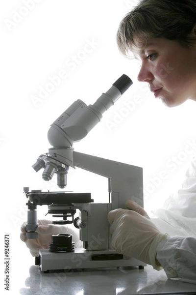 Fototapeta Scientist and microscope