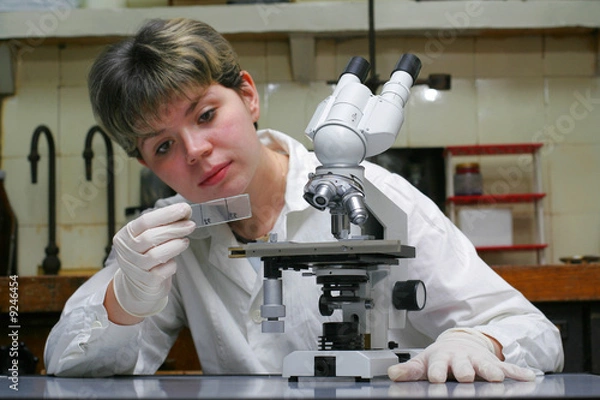 Fototapeta Scientist and microscope