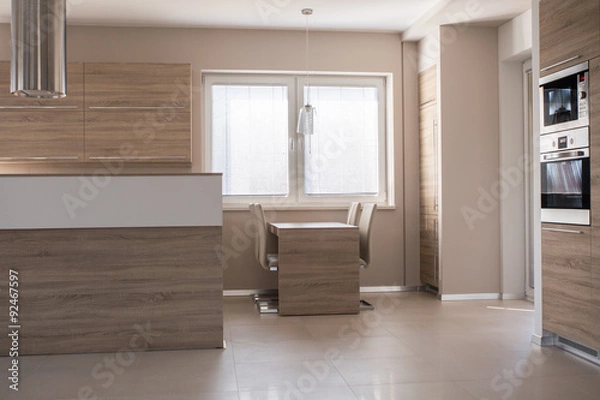 Fototapeta Small dining table in kitchen