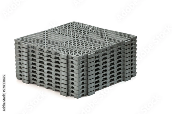 Obraz Stack of Anti-slip rubber mats in the bathroom, isolated on white background panels have a grid-like pattern on their surface, providing a sturdy and slip-resistant surface panels are stacked neatly
