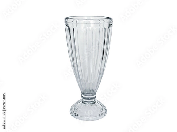 Fototapeta Empty clear milkshake glass isolated on a white background with clipping path. Transparent tall glass cup mockup for cold drinks and ice cream sundae.