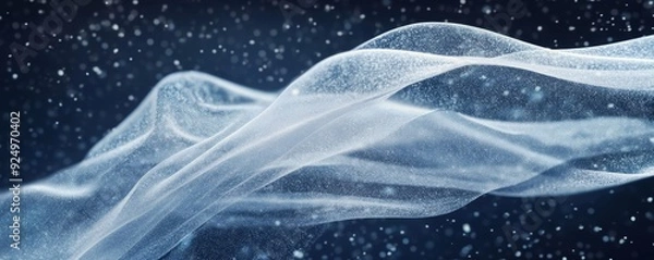 Fototapeta Abstract image of flowing white fabric with a blue background.