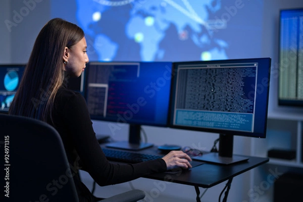 Obraz Busy Female IT Consultant in cyber security team working to prevent security threats, vulnerability and solve incidents