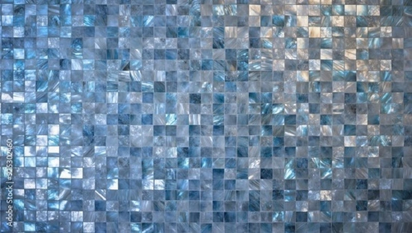 Fototapeta A detailed arrangement of blue and silver tiles covers a wall