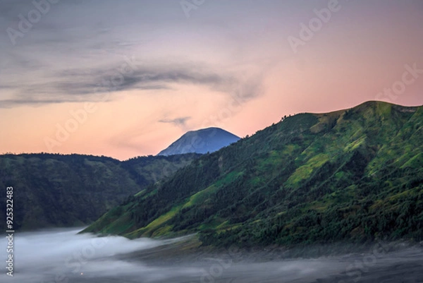 Fototapeta sunset over the mountains