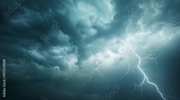 Fototapeta A lightning bolt is seen in the sky above a field