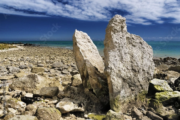 Obraz Megalith on dover coastline UK, free standing rocks that point upwards into the clouds under the cliffs at samphire hoe