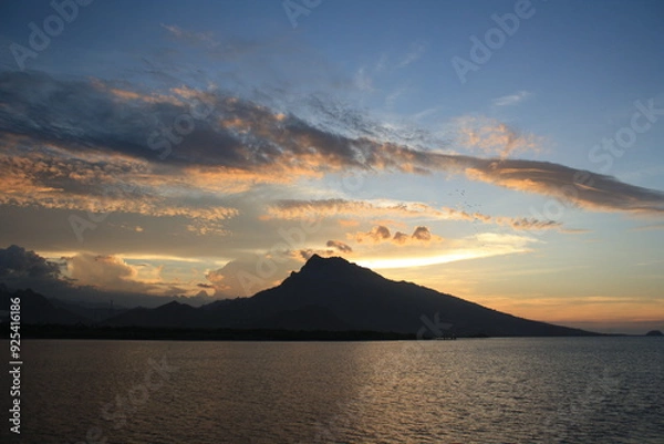 Fototapeta sunset over the mountains
