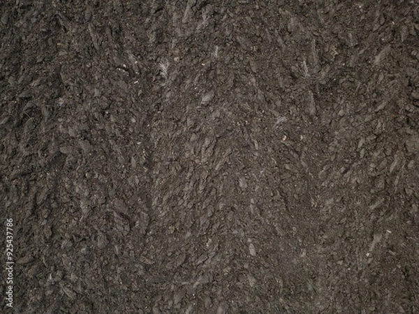 Fototapeta Dark ploughed field soil lump earth 3D agriculture field texture, crops drone aerial inspection, soil health check, irrigation conditions 