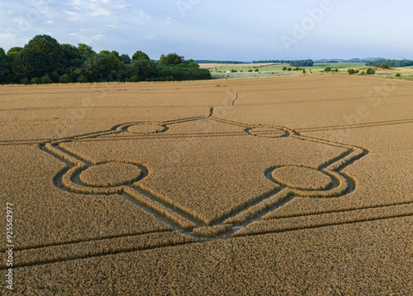 Obraz Aerial view of an intricate geometric crop circle formation in a wheat field at Normanton Down, near Stonehenge in Wiltshire, England, UK