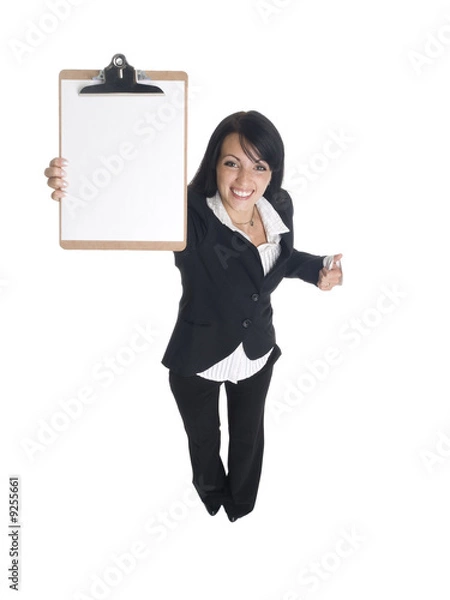 Obraz businesswoman presenting a blank clipboard.