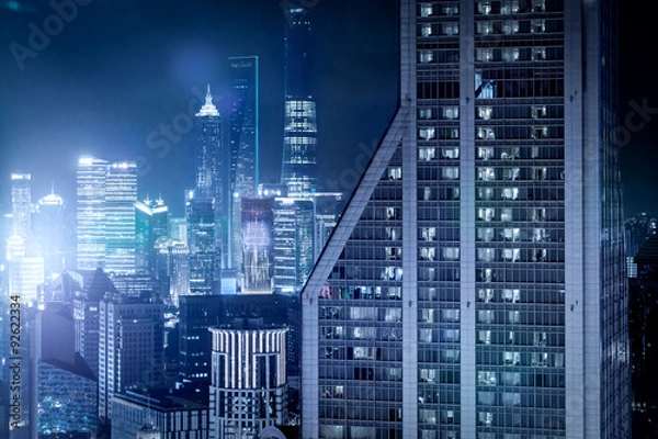 Fototapeta Stadtpanorama mit der Skyline von Shanghai bei Nacht