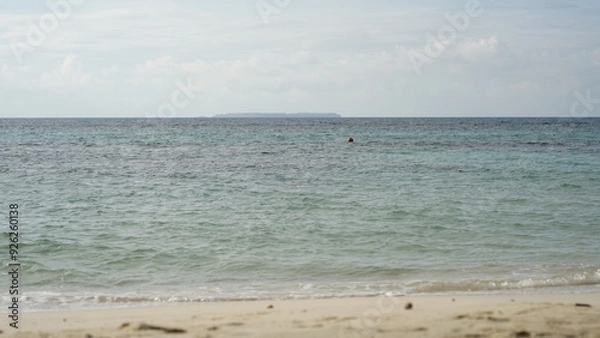 Fototapeta a view of a beach on the middle  pf the day