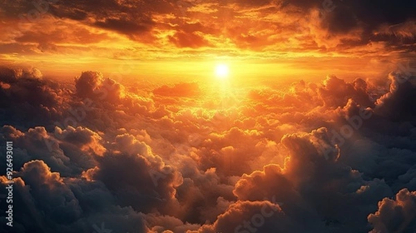 Fototapeta Epic sunset with a dramatic cloudscape, with warm light breaking through and casting a golden glow over the landscape.