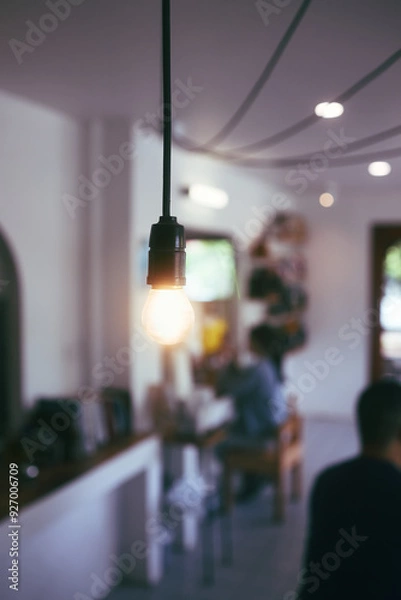 Fototapeta Tungsten lamp is hanging from ceiling