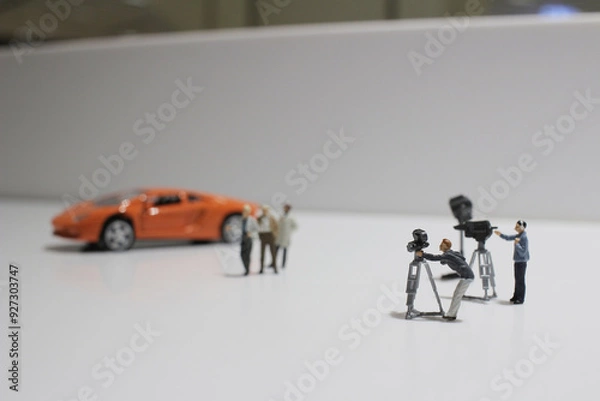 Obraz a movie making of small figure at the white background