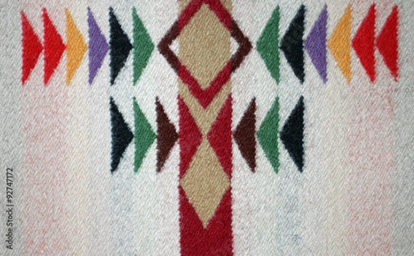 Fototapeta Symmetrical Multicolored Design on a Woven Woolen Blanket