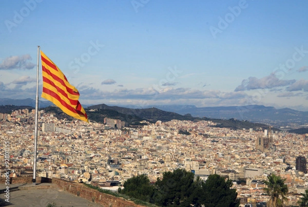 Fototapeta BARCELONA, CATALONIA, SPAIN - DECEMBER 14, 2011: Catalan flag fluttering in the wind in Montjuic Castle