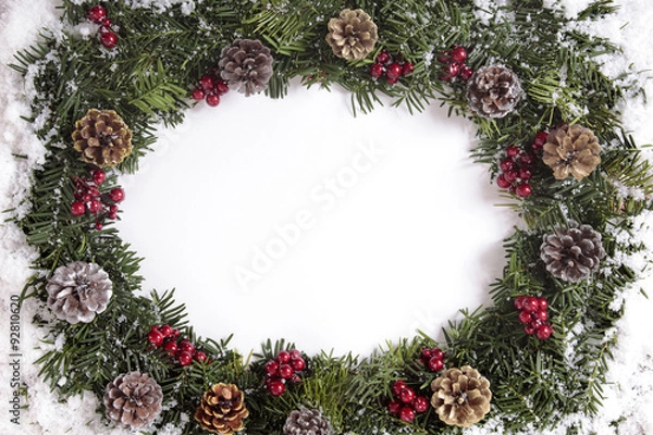 Obraz Christmas wreath in snow with copy space