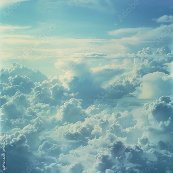 Fototapeta view from airplane window clouds above the sky
