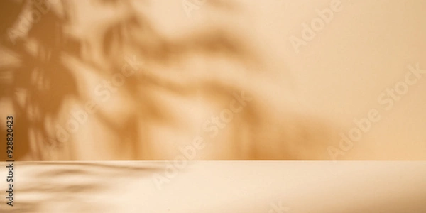 Fototapeta Stylish panoramic background with beige wall and tree shadows and empty product space.