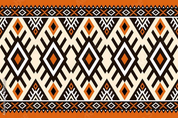 Fototapeta Vibrant ethnic pattern featuring geometric shapes in orange, black, and cream. Symmetrical ethnic design with diamond motifs and zigzag lines. Ideal for contemporary ethnic-inspired backgrounds.