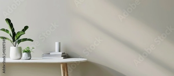 Fototapeta desk with plants and books, overlooking the sea through large windows. Web banner with copyspace