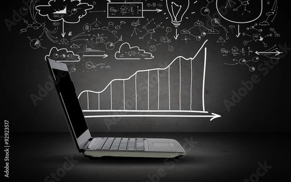 Obraz open laptop computer with scheme and chart doodles