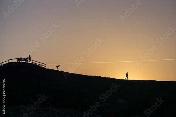 Fototapeta 2 figures in the sunset