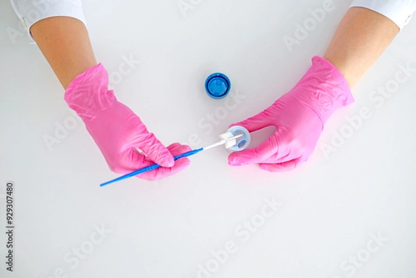 Obraz A brush for taking a swab from the cervical canal of the female  organs for examination for the presence of cancer cells