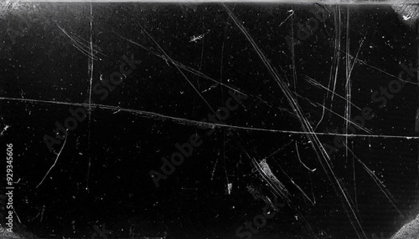 Fototapeta Dusty scratched and scanned old film texture with cracks; dirty grunge style overlay for photo or banner