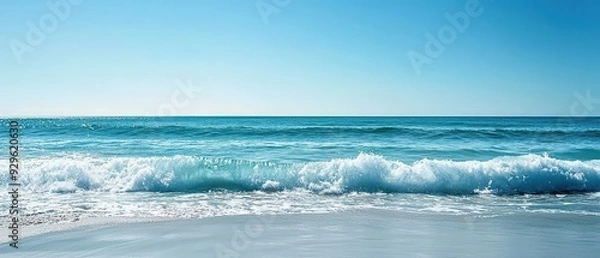 Fototapeta A tranquil blue ocean scene with soft waves and a clear sky