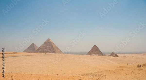 Fototapeta Pyramids of Giza, Cairo, Egypt and camels in the foreground