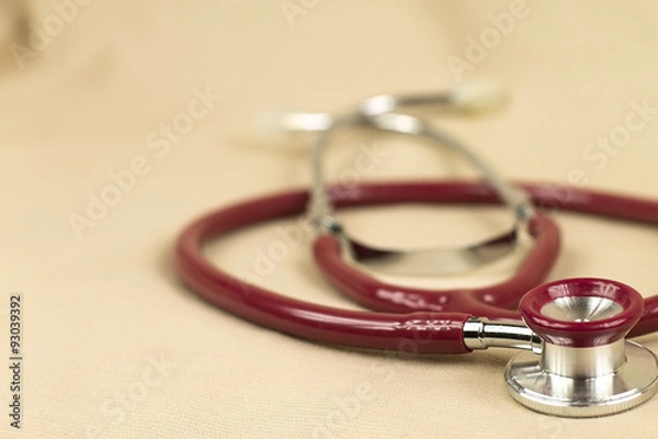 Obraz Stethoscope on red background