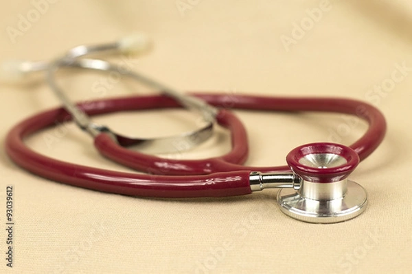 Obraz Stethoscope on red background