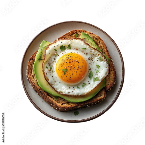 Fototapeta Fried egg and avocado on toast breakfast food concept with a healthy eating idea