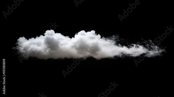 Fototapeta A fluffy white cloud with a wispy tail, isolated on a black background.