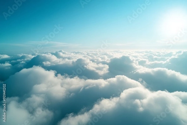 Fototapeta Beautiful blue sky with white clouds from above.