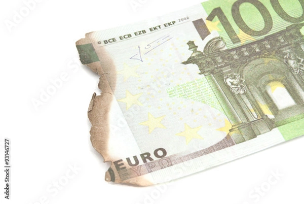 Obraz burnt bills of hundred euro on white