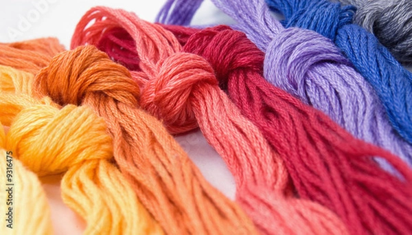 Fototapeta Close-up of colorful buns of threads