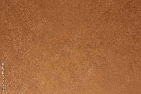 Fototapeta Soil wall texture of old clay house structure. Mud home. 