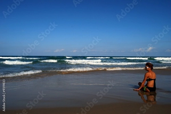 Obraz Woman on the beautiful beach of sea