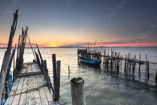 Obraz End of day with a relax sunset at an old pier