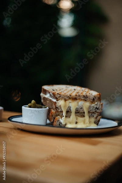 Obraz sandwich in a restaurant melted cheese