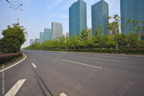 Obraz Empty road surface with modern city buildings background