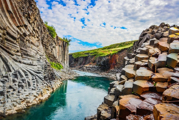 Fototapeta Stuoðil Canyon Iceland, Rock formation and river running through a unique canyon 