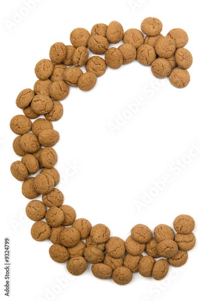 Fototapeta Little ginger nuts in the form of the letter C.